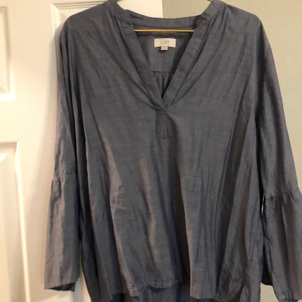 Blue shirt with bell sleeves